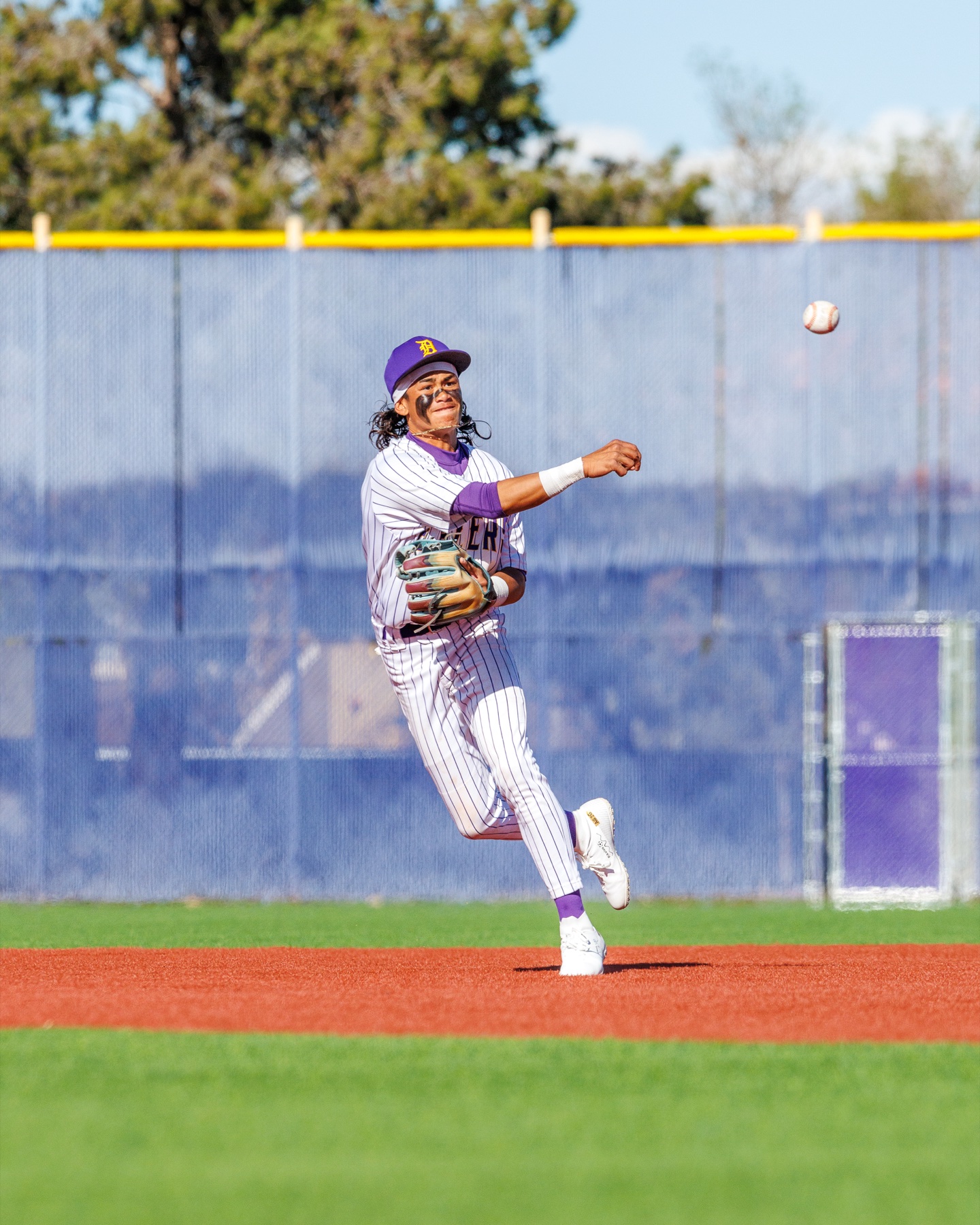 Baseball player throwing a ball photographed by Vegas Photo Guys